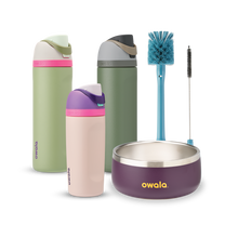 Family Bundle with accessories; two tall FreeSip water bottles in green and pink-mauve, a Kids Tumbler in pink-mauve with teal lid, a purple Pet Bowl with stainless rim, and a blue bottle brush