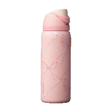 FreeSip 32oz Sugar Plum Fairy; rotating view of light pink body with diagonal lattice pattern of pastel pink, lavender, and cream ribbon bows, matching pink flip cap, pink carry loop, and cream push-button