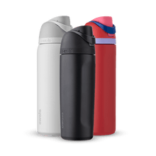 Three FreeSip bottles in white, black, and red