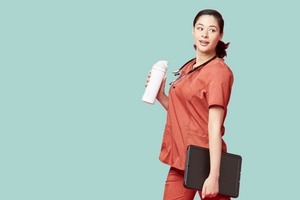 A nurse holding an Owala bottle for Nurse Day and Nurse Week