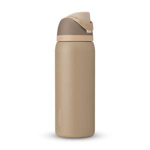 Full profile shot of the 32oz Down to Earth FreeSip water bottle in tan, highlighting its tan and silt colors.