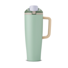 FreeSip Tumbler 40oz Eucalyptus, sage green body with white flip cap, tan carry loop, and tan handle
